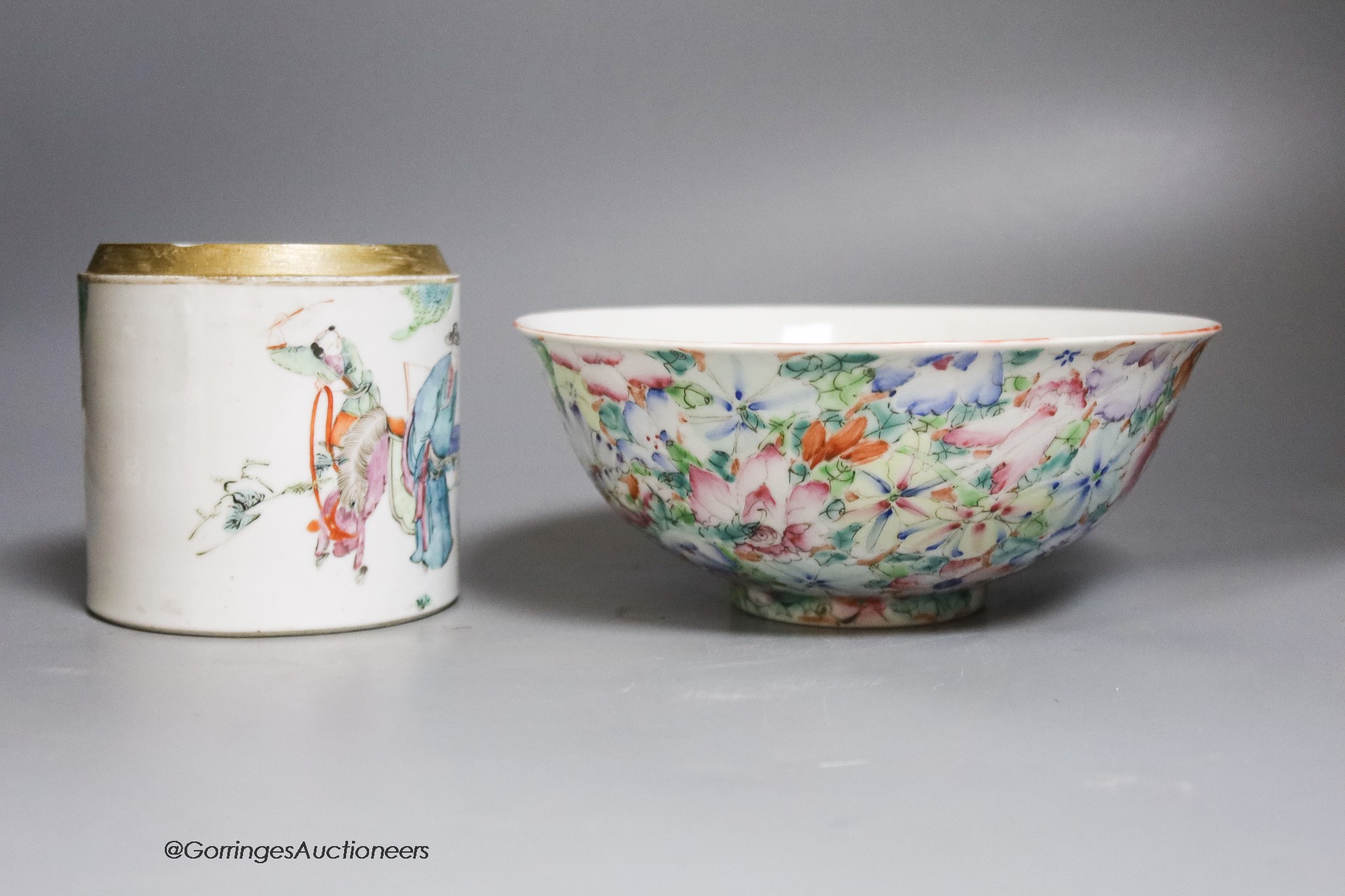 A Chinese famille rose millefleur bowl and a jar lacking cover, 19cm